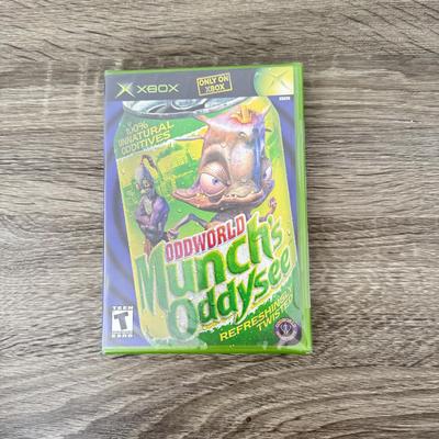 LOT 196B: XBOX Game Case, NIP Oddworld Munch's Oddysee for XBOX & Collection of PC Games: The Sims & More