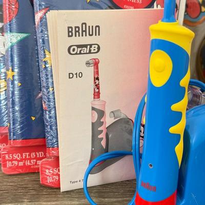 LOT 201A: Disney Kids' Collection: Braun Oral B Mickey Mouse Electric Toothbrush w/ NIP Heads, NIP Mickey Basketball Set, Wall...