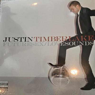 LOT 207B: Collection of Albums; Various Genres, Some New in Plastic Seal & Metal Album Holder