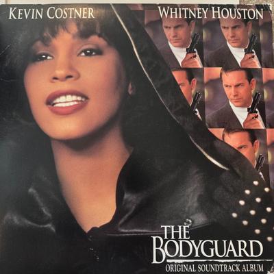 LOT 207B: Collection of Albums; Various Genres, Some New in Plastic Seal & Metal Album Holder