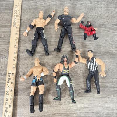 LOT 218B: Cool Kids Suitcase Full of a Variety of 1990s/Early 2000s Wrestling Action Figures