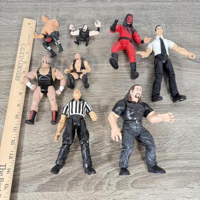 LOT 218B: Cool Kids Suitcase Full of a Variety of 1990s/Early 2000s Wrestling Action Figures