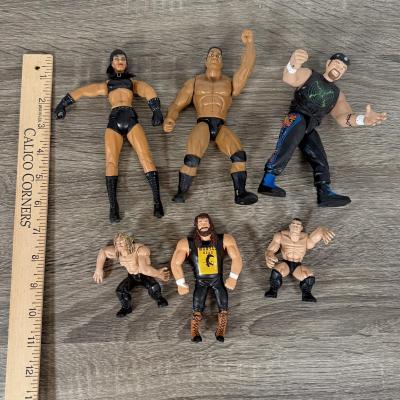 LOT 218B: Cool Kids Suitcase Full of a Variety of 1990s/Early 2000s Wrestling Action Figures