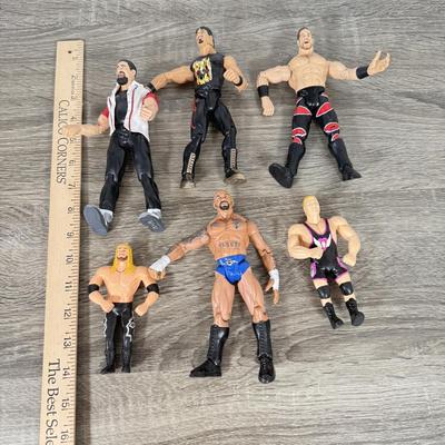 LOT 218B: Cool Kids Suitcase Full of a Variety of 1990s/Early 2000s Wrestling Action Figures