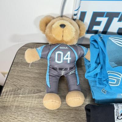 LOT 219B: Philadelphia Soul Football Collection: T-Shirts, Signed Program, Banner & Teddy Bear