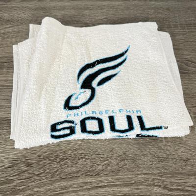 LOT 219B: Philadelphia Soul Football Collection: T-Shirts, Signed Program, Banner & Teddy Bear