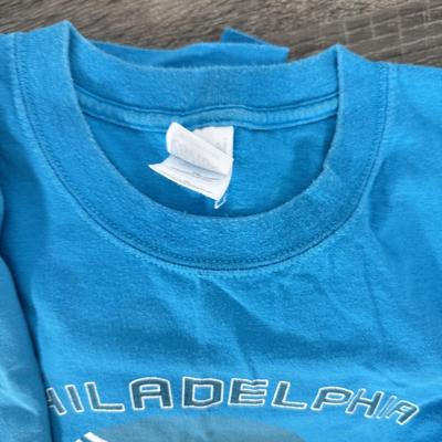 LOT 219B: Philadelphia Soul Football Collection: T-Shirts, Signed Program, Banner & Teddy Bear