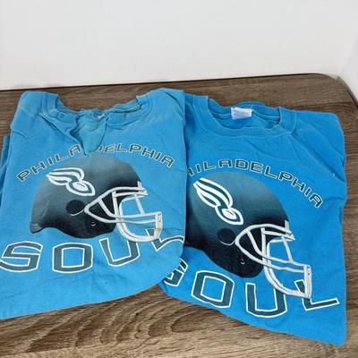 LOT 219B: Philadelphia Soul Football Collection: T-Shirts, Signed Program, Banner & Teddy Bear