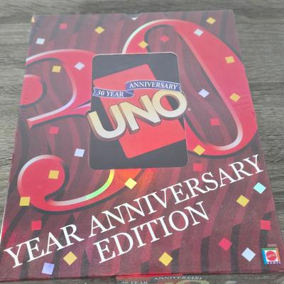 LOT 221A: Variety of Family Games; Uno 30 Year Anniversary Game is New In Sealed Box