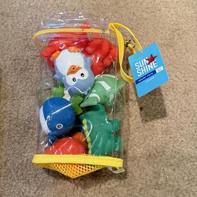 LOT 226L: NIP Water Toys: Swimline Arcade Shooter Target Game, Shift the Black Series RC Boat Racer & More