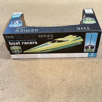 LOT 226L: NIP Water Toys: Swimline Arcade Shooter Target Game, Shift the Black Series RC Boat Racer & More