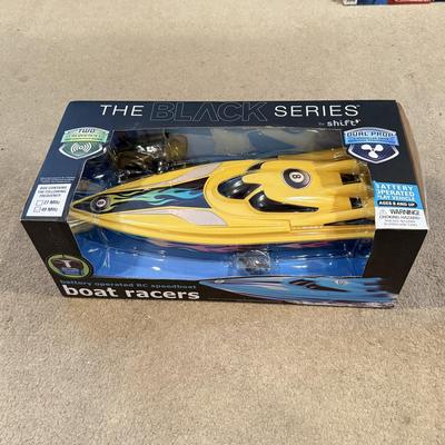 LOT 226L: NIP Water Toys: Swimline Arcade Shooter Target Game, Shift the Black Series RC Boat Racer & More