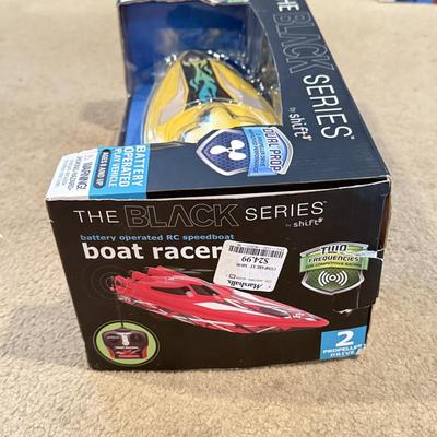 LOT 226L: NIP Water Toys: Swimline Arcade Shooter Target Game, Shift the Black Series RC Boat Racer & More