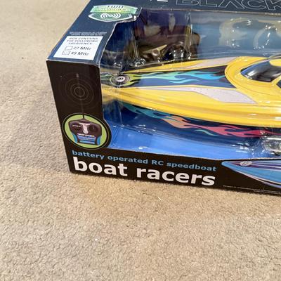 LOT 226L: NIP Water Toys: Swimline Arcade Shooter Target Game, Shift the Black Series RC Boat Racer & More