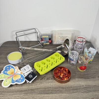 LOT 231L: Fun & Quirky Kitchen Collection: Collectible Cups/Glasses, Skull and Crossbones Ice Cube Trays, Oversized Catering Tools...