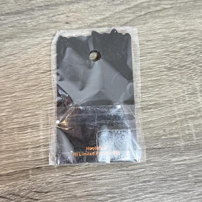 LOT 239B: Hooters Collection: Racing Champions NASCAR 2002 1:64 Transporter and Die-Cast Stock Car, Shot Glass & Motorcycle Pin