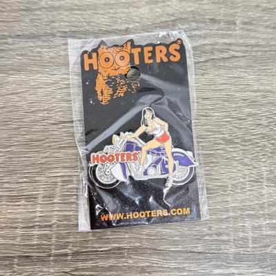 LOT 239B: Hooters Collection: Racing Champions NASCAR 2002 1:64 Transporter and Die-Cast Stock Car, Shot Glass & Motorcycle Pin