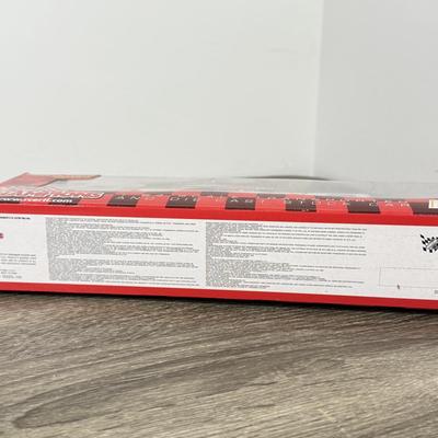 LOT 239B: Hooters Collection: Racing Champions NASCAR 2002 1:64 Transporter and Die-Cast Stock Car, Shot Glass & Motorcycle Pin