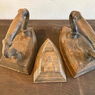 LOT 318: Vintage Framed The Midnight Rides of Paul Revere, Syroco Wall Hangings, Insurance Co Picture Cards and Three Sad Irons