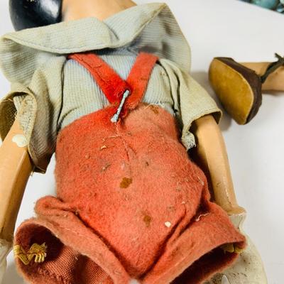 LOT 331: Vintage Composite Disney Pinocchio Doll (see description) and Disneyland Booklet and Map