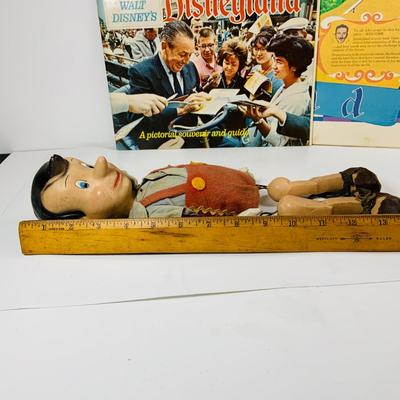 LOT 331: Vintage Composite Disney Pinocchio Doll (see description) and Disneyland Booklet and Map