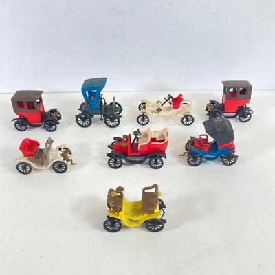 LOT 359: Antique Car Collection - Plastic Toy Cars, Sunoco Car Coins and Ceramic 1913 Chevrolet