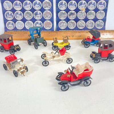 LOT 359: Antique Car Collection - Plastic Toy Cars, Sunoco Car Coins and Ceramic 1913 Chevrolet