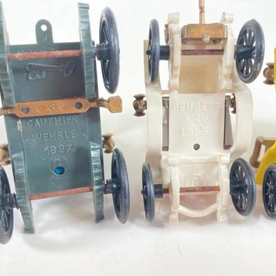 LOT 359: Antique Car Collection - Plastic Toy Cars, Sunoco Car Coins and Ceramic 1913 Chevrolet