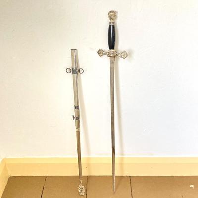 LOT 364: Vintage In Hoc Signo Vinces Monogramed Sword with Sheath, Leather Carrying Case and Protective Cloth