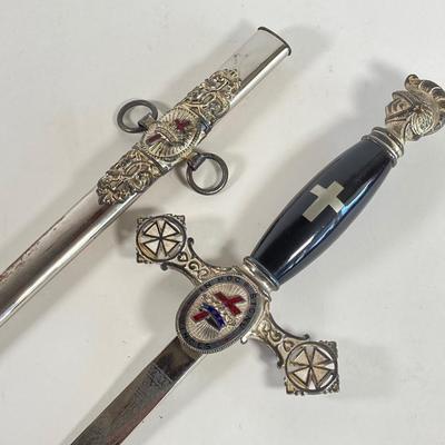 LOT 364: Vintage In Hoc Signo Vinces Monogramed Sword with Sheath, Leather Carrying Case and Protective Cloth