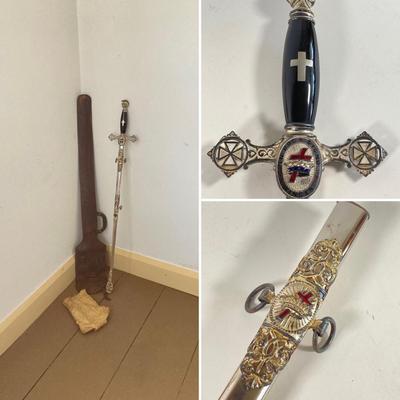 LOT 364: Vintage In Hoc Signo Vinces Monogramed Sword with Sheath, Leather Carrying Case and Protective Cloth