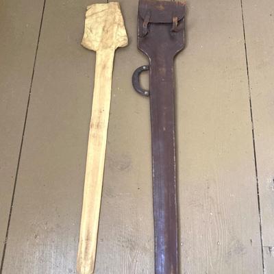 LOT 364: Vintage In Hoc Signo Vinces Monogramed Sword with Sheath, Leather Carrying Case and Protective Cloth