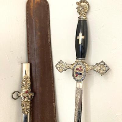 LOT 364: Vintage In Hoc Signo Vinces Monogramed Sword with Sheath, Leather Carrying Case and Protective Cloth
