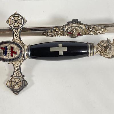 LOT 364: Vintage In Hoc Signo Vinces Monogramed Sword with Sheath, Leather Carrying Case and Protective Cloth