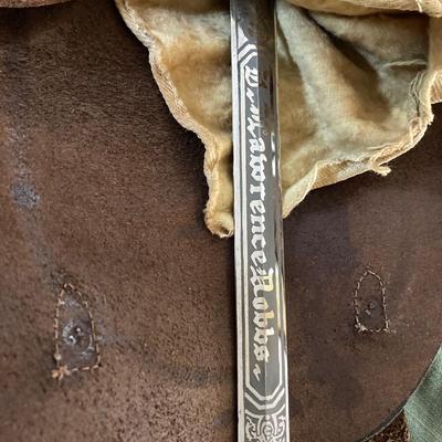 LOT 364: Vintage In Hoc Signo Vinces Monogramed Sword with Sheath, Leather Carrying Case and Protective Cloth