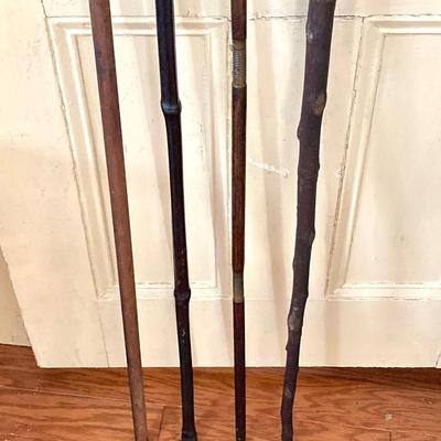 LOT 369: Four Vintage Wooden Walking Sticks
