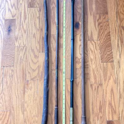 LOT 369: Four Vintage Wooden Walking Sticks