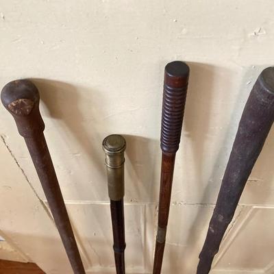 LOT 369: Four Vintage Wooden Walking Sticks