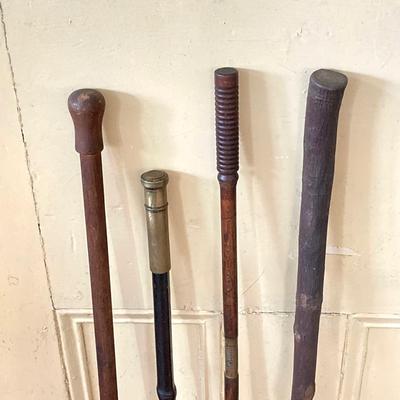 LOT 369: Four Vintage Wooden Walking Sticks