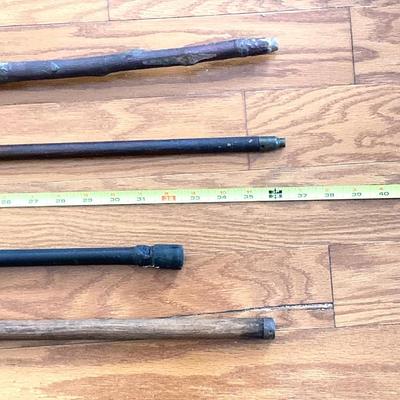 LOT 369: Four Vintage Wooden Walking Sticks