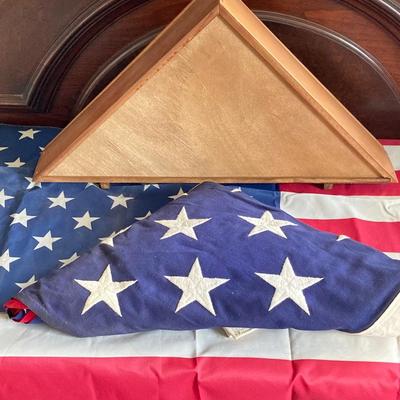 LOT 370: Collection of American Flags - Veteran Honored Folded in Wooden Case, Folded Best Valley Forge Brand and More