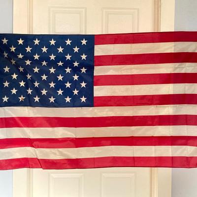 LOT 370: Collection of American Flags - Veteran Honored Folded in Wooden Case, Folded Best Valley Forge Brand and More