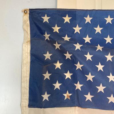 LOT 370: Collection of American Flags - Veteran Honored Folded in Wooden Case, Folded Best Valley Forge Brand and More