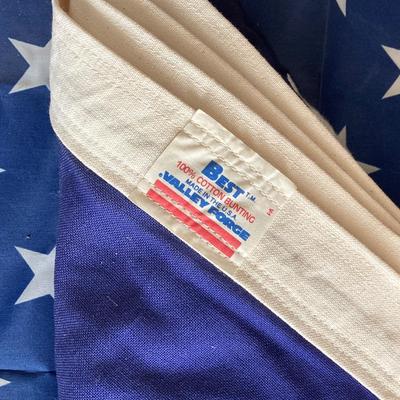 LOT 370: Collection of American Flags - Veteran Honored Folded in Wooden Case, Folded Best Valley Forge Brand and More