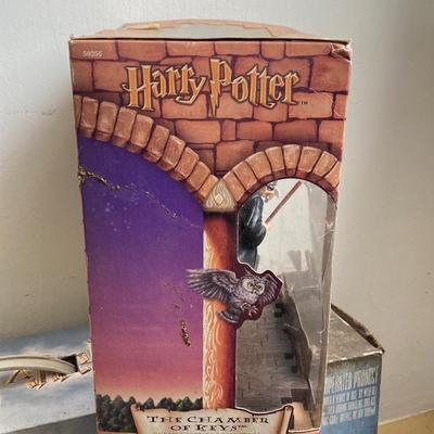 LOT 376: Harry Potter Collectibles - "The Chamber of Keys" Classic Scenes Collection and "The Chamber of Secrets"...