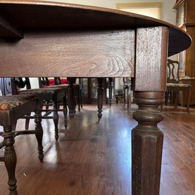 LOT 382: Antique Table (wooden slides & wheels), 2 set of 4 Vintage Chairs