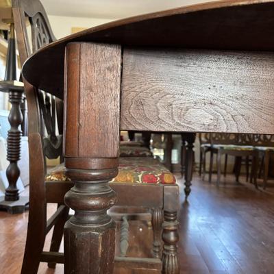 LOT 382: Antique Table (wooden slides & wheels), 2 set of 4 Vintage Chairs