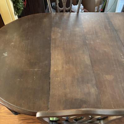 LOT 382: Antique Table (wooden slides & wheels), 2 set of 4 Vintage Chairs