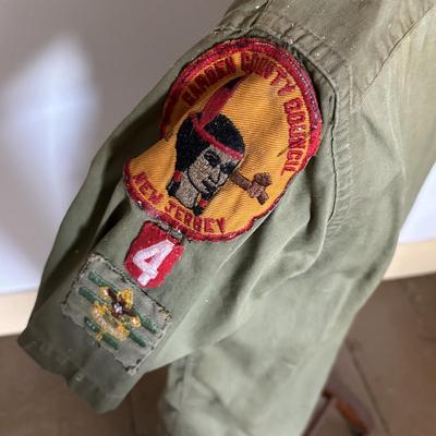 LOT 388: Boy Scott of America Collection: Handcrafted Barrel Drum & Miniature Canoes, Clothing w/Patches, Handbooks, Song Books &...