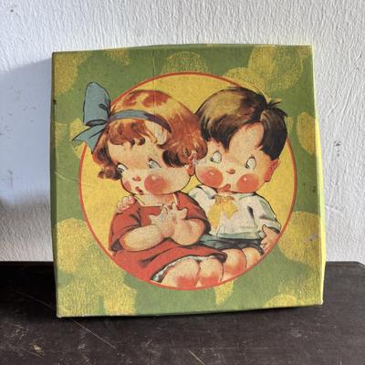 LOT 404 Well Loved Antique Toy Collection: Rudolph Steiner Co. The 15 Puzzle Bakelite Game w/Storage, Composition Doll, Nosey Hound...